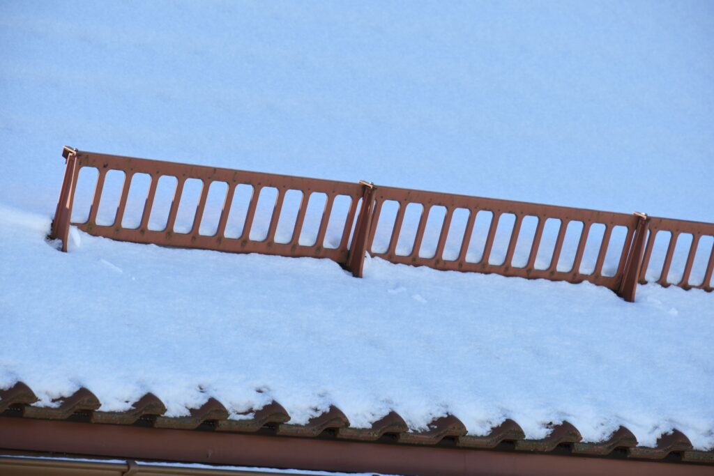 Benefits of Installing Snow Guards on Your Metal Roof