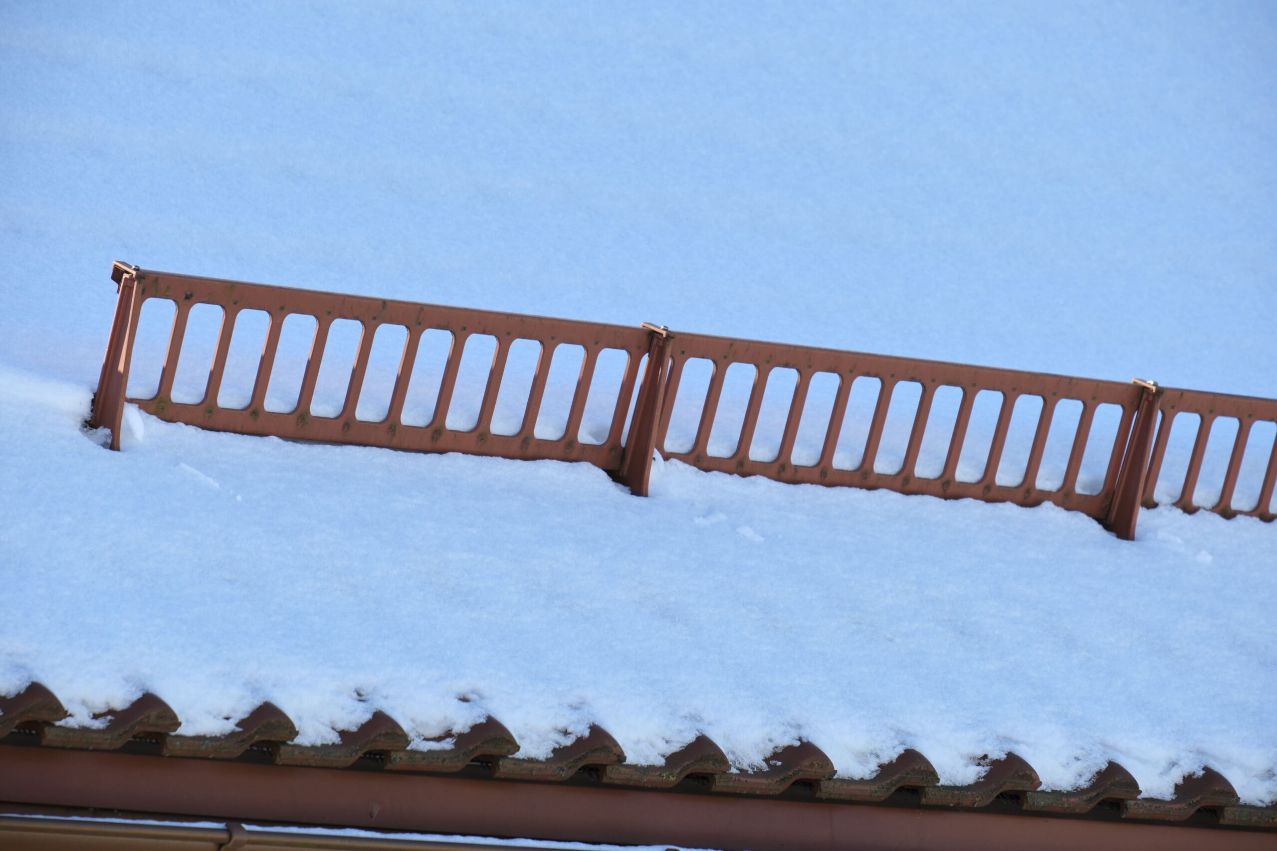 Benefits of Installing Snow Guards on Your Metal Roof